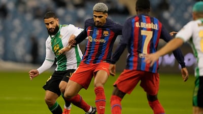 Ronald Araujo 7 - The best player in the air and carried the ball forward well, but was turned a couple of times by the fleet-heeled Betis attack. AP
