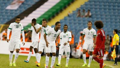 Saudi Arabia’s Nasser Al Shamrani, centre, taunts Omar Abdulrahman, right, of the UAE during last year’s Gulf Cup semi-final in Riyadh. Al Ittihad
