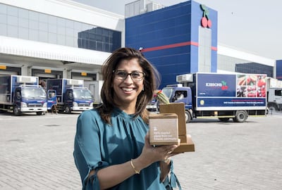 Halima Jumani with flower pots made from recycled plastic. Ruel Pableo for The National
