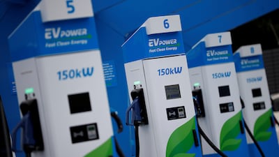 Electric vehicle charging units are pictured at newly opened Motor Fuel Group EV Power service station in Manchester, England. Reuters