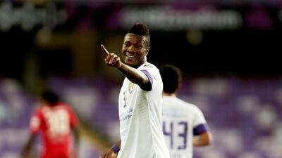 Al Ain's Asamoah Gyan celebrates scoring his second goal against Al Jazira during their Arabian Gulf League match at Hazza bin Zayed stadium in Al Ain on May 1, 2014. Christopher Pike / The National