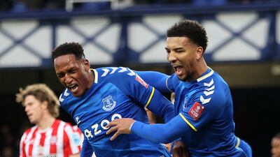 Yerry Mina of Everton celebrates with team mate Mason Holgate after scoring the first goal against Brentford. Getty