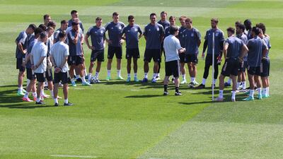 Germany's coach Joachim Low speaks to his players ahead of the Group F match against Portugal. Getty