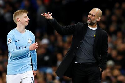 Manchester City manager Pep Guardiola, right, with Oleksandr Zinchenko, will look for his side to take a step closer to the Premier League title at Stoke City. Jason Cairnduff / Action Images via Reuters