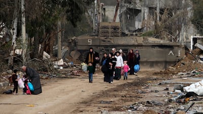Palestinians cross from the northern Gaza Strip to the south after Israel and Hamas agreed to a temporary truce. EPA