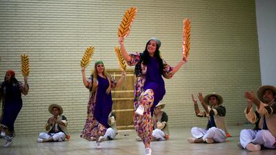 Kurdish dancers, from the Folk Arts group, perform in Erbil, Iraq. Reuters