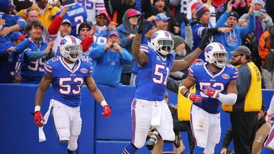The linebacking corp of Nigel Bradham, left, Brandon Spikes, centre, and Preston Brown have been the strength of the Buffalo defence. Brett Carlsen / AFP
