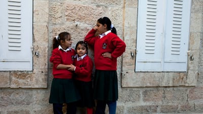 A grand building that once housed approximately 400 children is reduced to only 20 due to restrictions of access from the separation wall and checkpoints.
