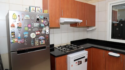The kitchen. Facilities in the building also include a swimming pool where residents and their families gather in the evening and at weekends
