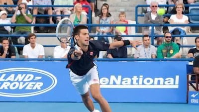 Novak Djokovic took three sets to beat Nicolas Almagro and defend his Abu Dhabi title.