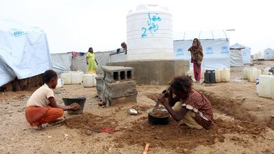 Yemenis gather at s makeshift camp for displaced people who fled fighting between the Houthi rebels and the internationally recognised government. AFP