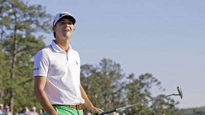 Smylie Kaufman reacts after missing a putt on the 18th green during the third round of the Masters golf tournament Saturday, April 9, 2016, in Augusta, Ga. (AP Photo/Jae C. Hong)