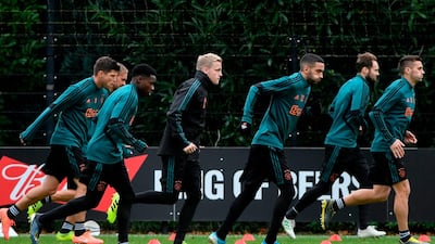 Donny van de Beek, centre, has been a first-team regular for Ajax, while Tammy Abraham and Mason Mount have only just broken through at Chelsea - despite being similar ages. AFP