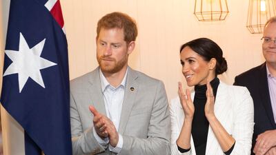 Meghan, Duchess of Sussex, wears a L'Agence blazer and Wolford sweater in Sydney on October 21, 2018. AP