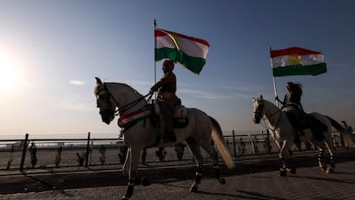 Horsemen take part in celebrations of the Iraqi Kurdish flag day in Erbil, the capital of the autonomous Kurdish region in northern Iraq, on December 17, 2017. Safin Hamed / AFP