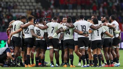 The Fiji players huddle following their 29-17 Rugby World Cup defeat against Tier One Wales. Getty