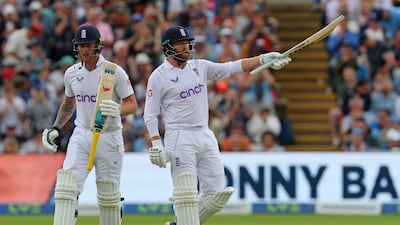 England's Jonny Bairstow celebrates reaching his half century. AFP