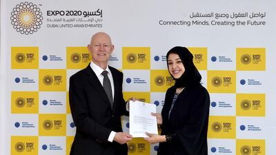 Reem Al Hashimy, UAE Minister of State for International Cooperation and director general of Dubai Expo 2020 Bureau, receives a letter confirming Norway's participation in Expo 2020 from Jens Eikaas, Norway’s Ambassador to the UAE. Courtesy Expo 2020 Dubai