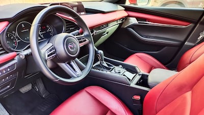 The car is equipped with an 8.8-inch infotainment screen, a sunroof, Bose audio system, lane-departure warning, as well as front and rear parking sensors.