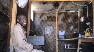 An Ugandan construction worker during the midday break.