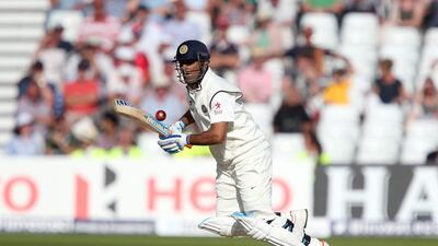 MS Dhoni plays a shot in the Test against England in July. Jan Kruger / Getty Images / July 9, 2014
