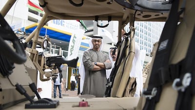 Sheikh Mohammed bin Zayed, Crown Prince of Abu Dhabi and Deputy Supreme Commander of the Armed Forces, views a vehicle at the Al Masaood Automobiles stand at the 2017 International Defence Exhibition and Conference. Hamad Al Kaabi / Crown Prince Court – Abu Dhabi