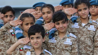 Emirati children wear mock military uniforms to promote the UAE’s Expo 2020 bid during the Dubai Airshow. Christopher Furlong / Getty Images