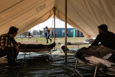 Syrian refugees play football inside the Temporary Accommodation Centre next to Nicosia. AFP