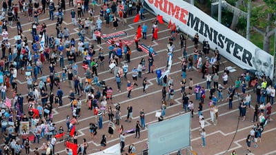 Protesters gather in Tel Aviv's Rabin Square on June 6, 2020, to denounce Israel's plan to annex parts of the occupied West Bank. Israeli Prime Minister Benjamin Netanyahu has vowed to forge ahead with annexing settlements and the Jordan Valley, in line with the peace proposals unveiled by US President Donald Trump. AFP