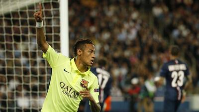 Neymar celebrates scoring the opener for Barca on Wednesday against Paris Saint-Germain in the Champions League quarter-final first leg match. Benoit Tessier / Reuters