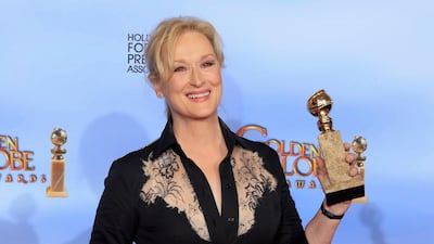 Actress Meryl Streep poses with her award for best performance by an actress in a motion picture - drama for "The Iron Lady" . REUTERS/Lucy Nicholson