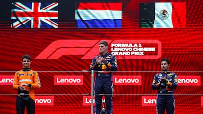 Race winner Max Verstappen alongside teammate Sergio Perez, right, who finished third, and McLaren's Lando Norris who was second. Getty Images