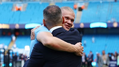 Erling Haaland with Khaldoon Al Mubarak. Reuters
