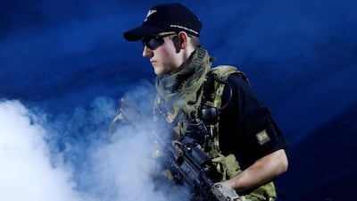 A man dress up as a soldier to promote AJ Design during the Gamescom fair. Ralph Orlowski / Reuters