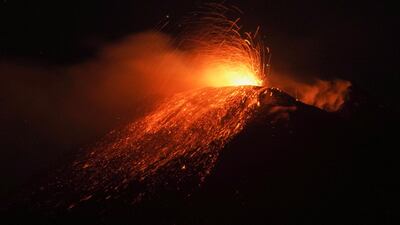 An eruption from Mount Etna lighting up the night sky is seen from the small village of Fornazzo under the volcano in Italy. Reuters