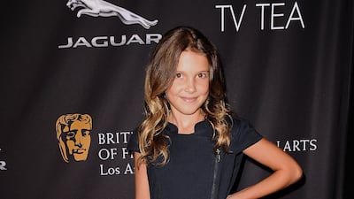 Millie Bobby Brown, wearing a black dress, attends the Bafta Los Angeles TV Tea Party on August 23, 2014, in Beverly Hills, California. Photo: FilmMagic