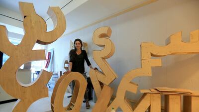 Erin Meekhof, winner of this year's Jean-Claude and Christo award, working on her sculpture for her big final project in a studio in Sama Tower where NYU Abu Dhabi offices are based. Ravindranath K / The National