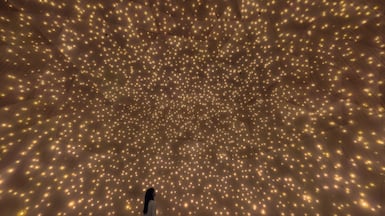 The Massless Suns and Dark Suns installation, now open at teamLab Phenomena Abu Dhabi, resembles a shifting, star-filled sky. Photo: teamLab Phenomena Abu Dhabi