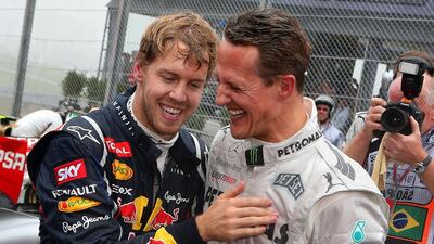Sebastian Vettel has won three Formula One world championships to Michael Schumacher's seven. Jens Buettner / EPA