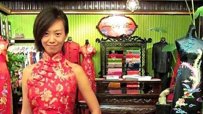 Guo Bin, 32, plans to wear a western-style white wedding dress for her wedding ceremony to her Italian fiance and a qipao for the reception, the mix of dresses reflecting the varying cultures being brought to the union.
