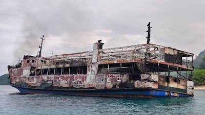 The burnt out boat after the fire was extinguished. AFP