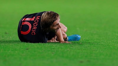 Croatia's Luka Modric down injured. Reuters