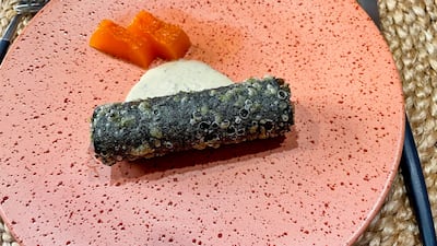 Bluefin tuna tartare in a crispy nori roll with kimchi melon.