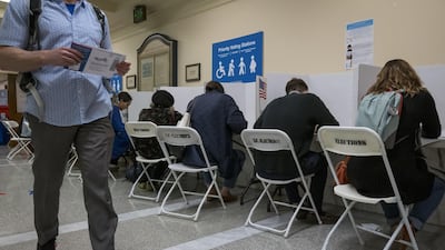 Voters cast ballots at a polling station in San Francisco, California, U.S. Bloomberg
