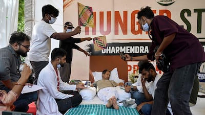 Doctors check hunger striker Sonam Wangchuk’s vital signs in New Delhi, India. The activist is demanding the resignation of Education Minister Dharmendra Pradhan over alleged examination irregularities. AFP