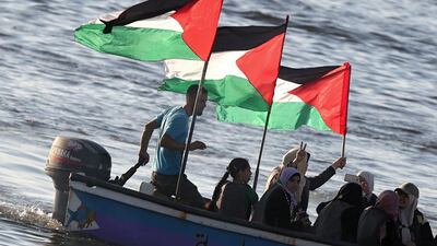 Palestinian women show their solidarity with a Gaza bound boat during a rally in Gaza port in the west of Gaza. The Israeli navy intercepted the boat which was trying to break the Israeli blockade of the Gaza Strip. Mohammed Saber / EPA