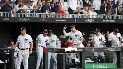 New York Yankees' Aaron Judge celebrates with teammates at the end of the match. Reuters