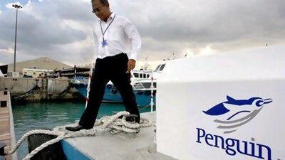 Penguin International has sold its 75 per cent stake in a Dubai joint venture, Penguin Marine Services. Paulo Vecona / The National