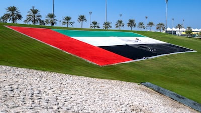 The UAE flag adorns Abu Dhabi Hill at the circuit. Victor Besa / The National
