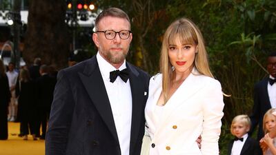 Guy Ritchie, left, and Jacqui Ainsley attend the premiere of Disney's 'The Lion King' in London's Leicester Square on July 14, 2019. AP